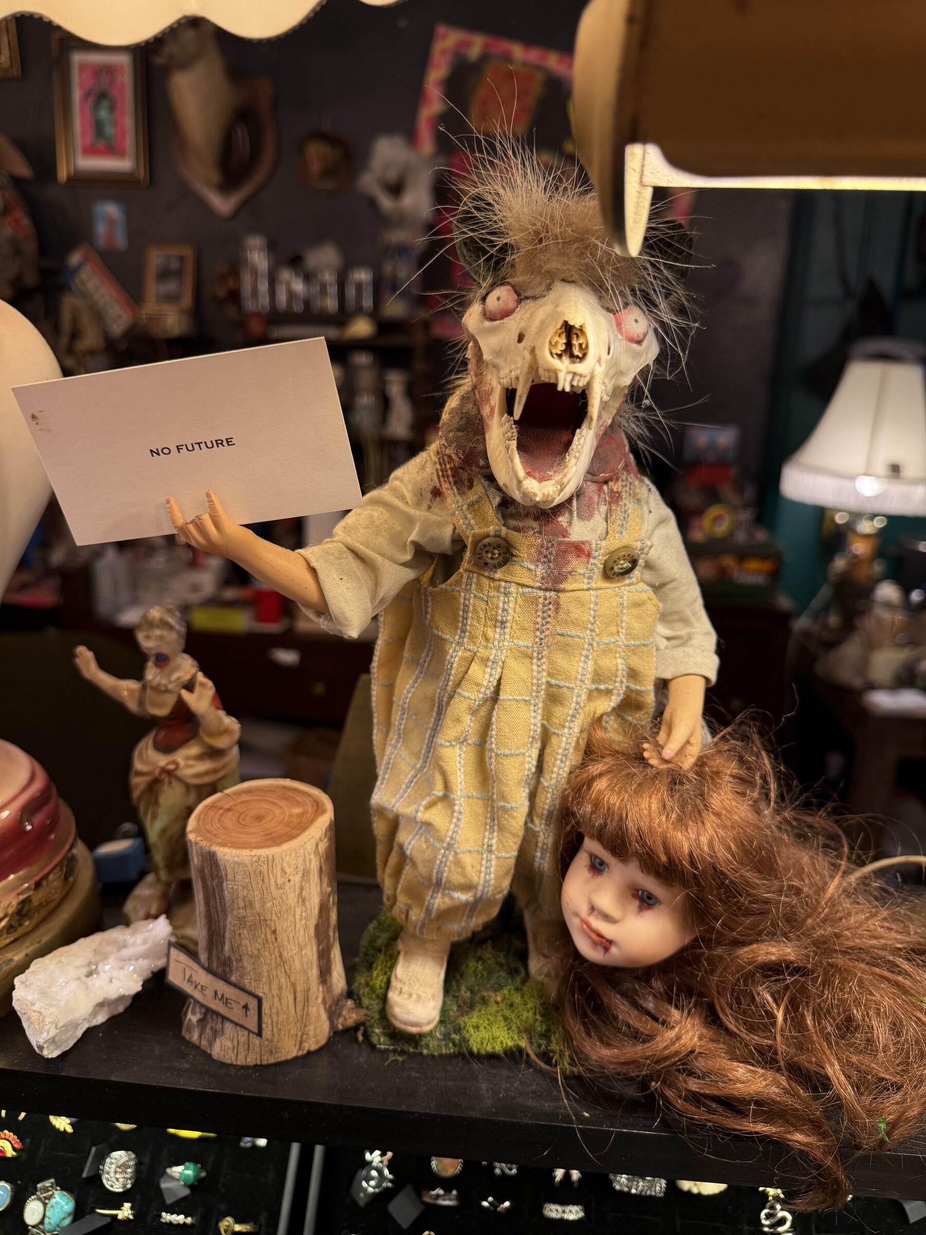 Porcelain doll with fanged puppet, NO FUTURE