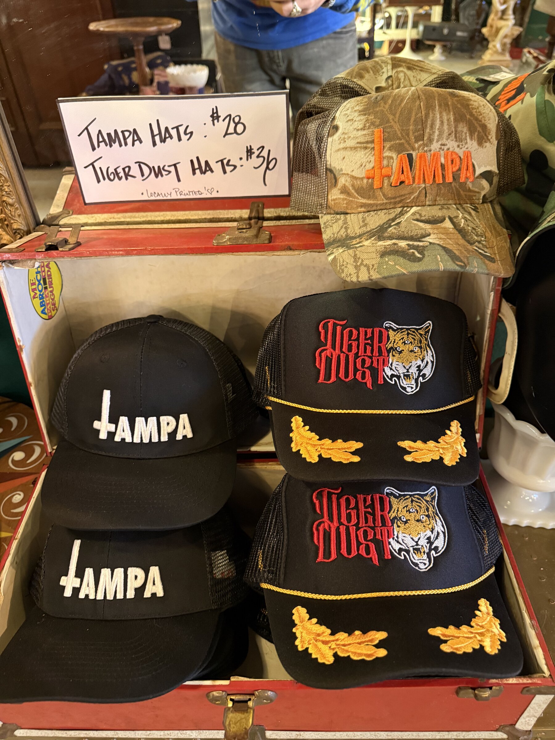 Two Tiger Dust hats and two Tampa hats